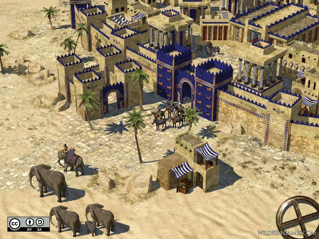0 A.D. historical city scene with blue gates, cavalry and elephants; original Wildfire Games and CC BY-SA marks retained.