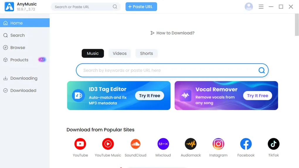 AnyMusic Windows home screen with keyword and URL search, Music, Videos and Shorts tabs, and Downloading and Downloaded navigation.