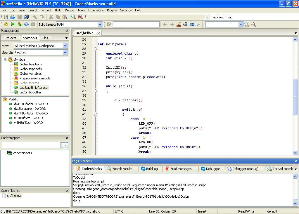 Historical Windows Code::Blocks workspace from the user manual: C source editor, Symbols pane and build logs; not a 25.03 capture.