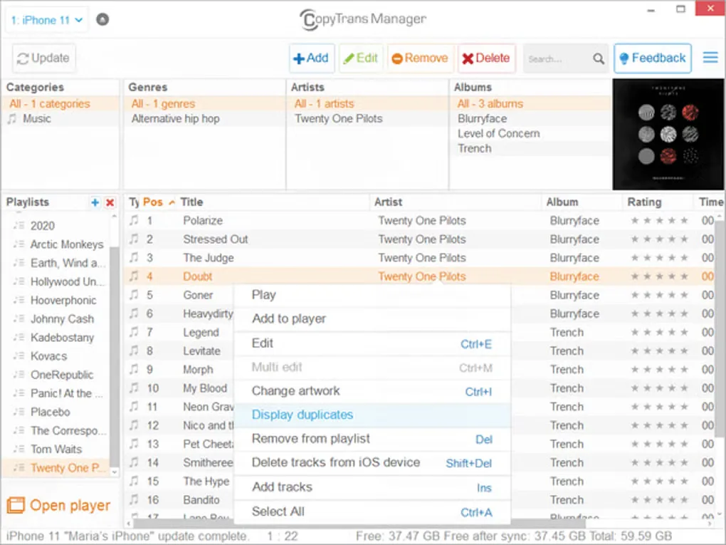 CopyTrans Manager for Windows showing playlists, track details and the Display duplicates context-menu option.
