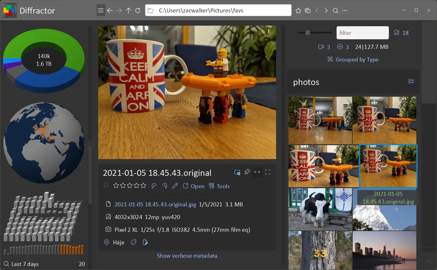 Diffractor on Windows showing a selected photo, file and camera metadata, collection charts and a grid of photo thumbnails.