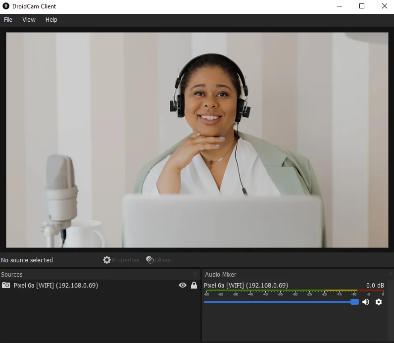 DroidCam Client for Windows showing a camera preview, a Pixel 6a WiFi source and the audio mixer.