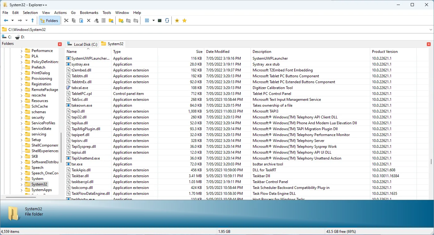 Explorer++ Details view showing C:\Windows\System32, a folder tree, two tabs and file metadata columns.
