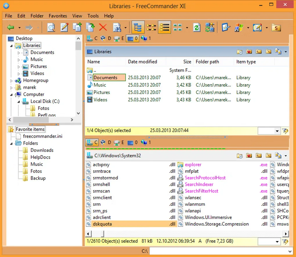 Older FreeCommander XE interface with a folder tree, favorites and two stacked file panes showing Libraries and Windows System32.