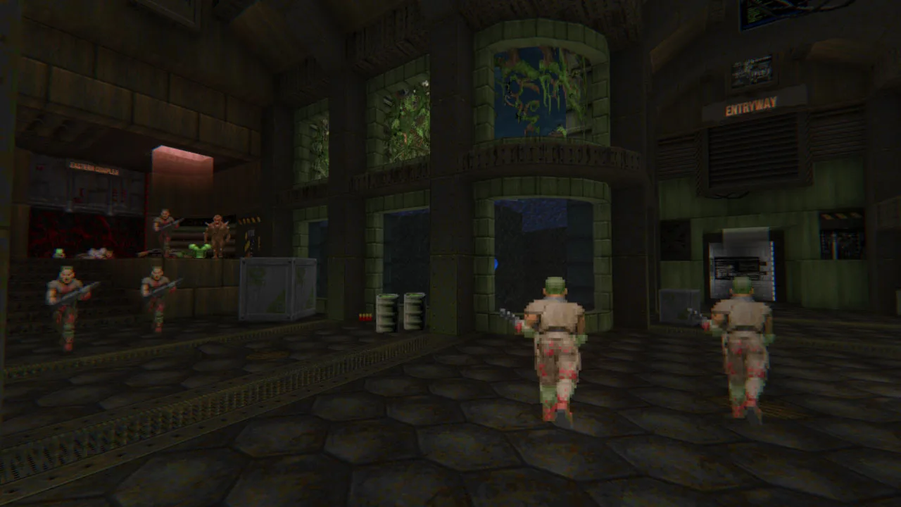 ZDoom Community Map Project #2 gameplay scene showing soldiers in a dark industrial hall, from the official ZDoom gallery