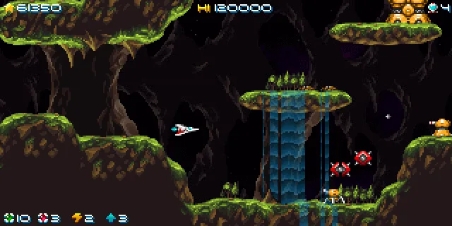 Hydorah gameplay with a spaceship flying through a mossy cavern, red enemies and the score and weapon HUD.