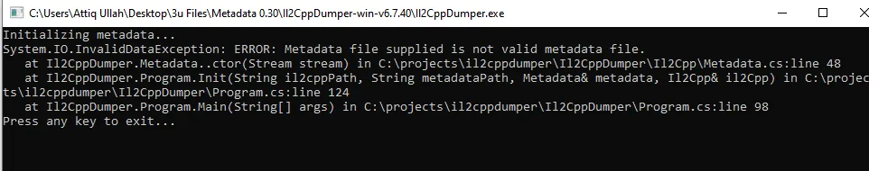 Historical Il2CppDumper 6.7.40 Windows console displaying an invalid metadata error