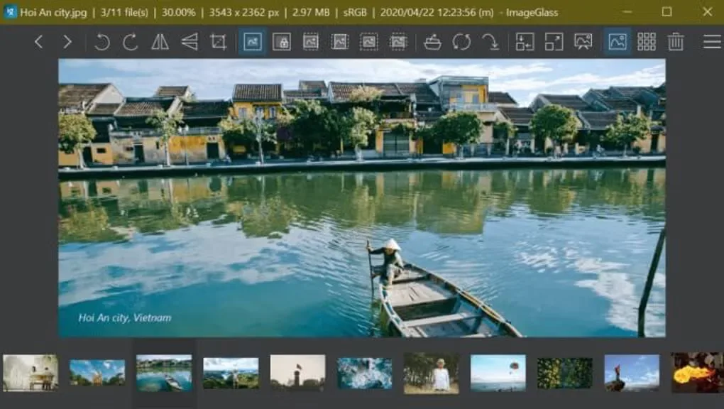 Earlier ImageGlass Windows interface displaying a Hoi An photograph, toolbar and bottom thumbnail strip.