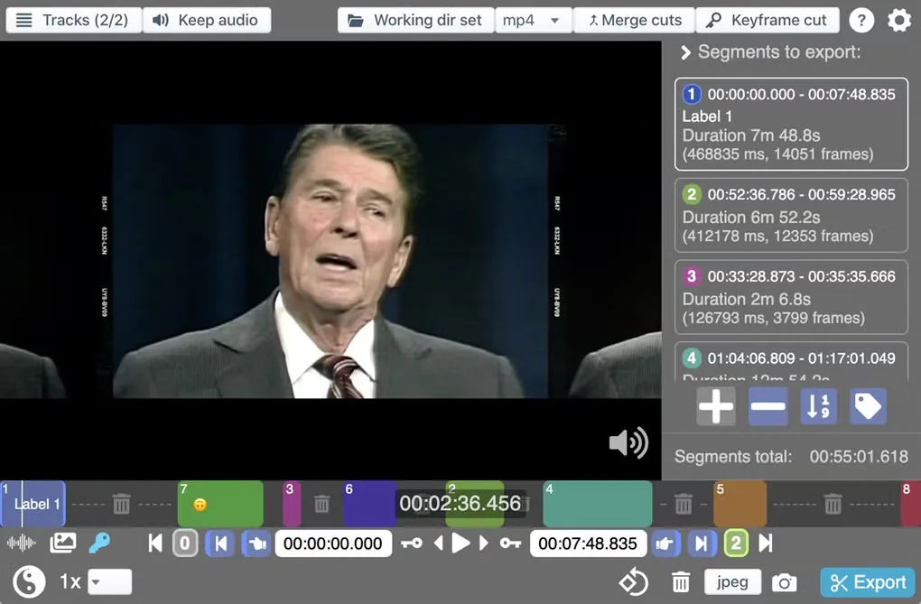 LosslessCut with a video preview, colored timeline segments, track controls and a list of segments to export