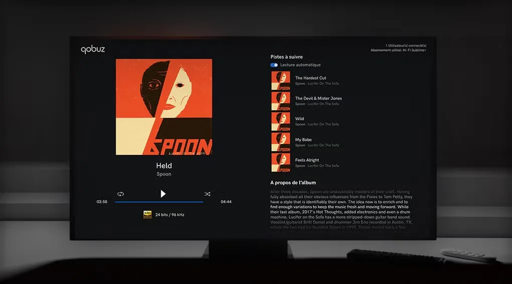 Qobuz promotional playback screen showing Spoon album art, playback controls, an upcoming track list and album notes.