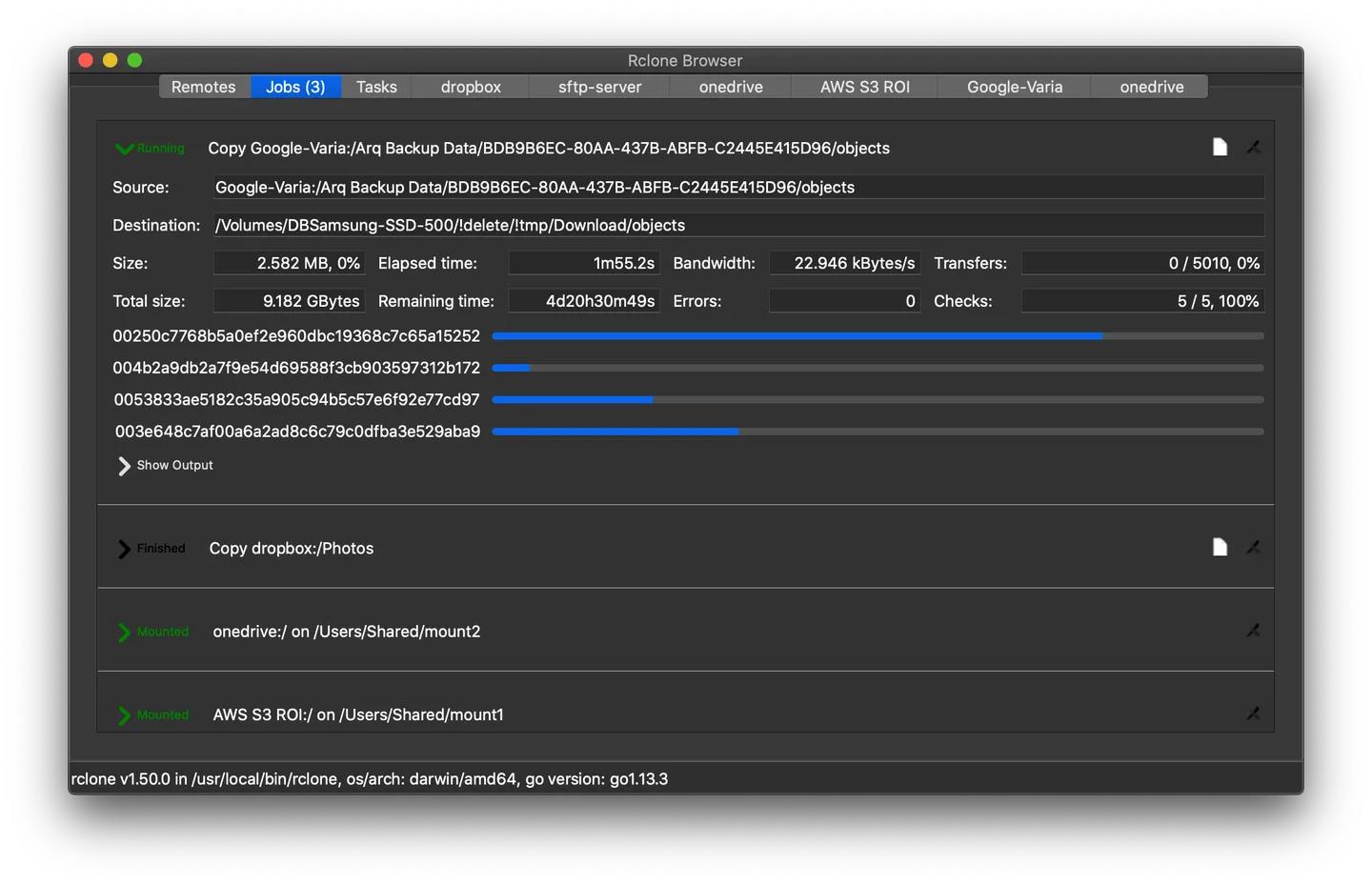 Rclone Browser on macOS in dark mode, with the Jobs tab showing transfer progress and mounted remotes.