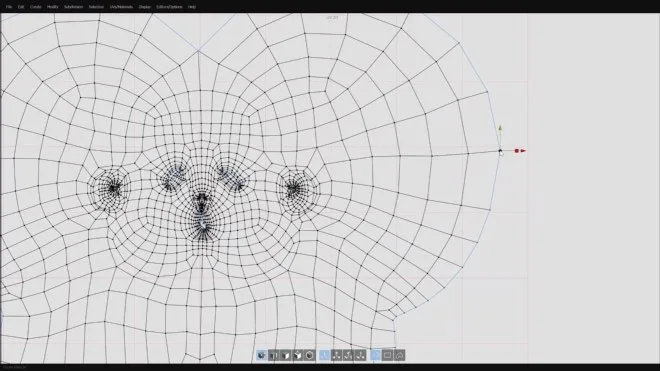 Silo UV workspace showing an unwrapped character-face wireframe, top menu and bottom viewport controls