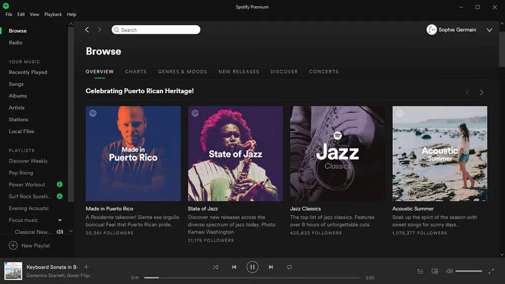 Older Spotify Windows desktop Browse screen with playlist tiles, library sidebar and playback controls