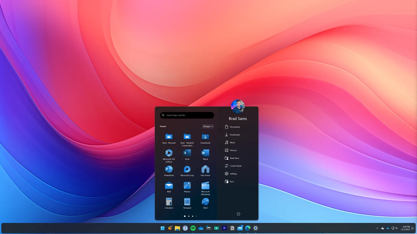 Start11 Pro-style Start menu with pinned apps, folder shortcuts and a rounded floating taskbar on Windows.