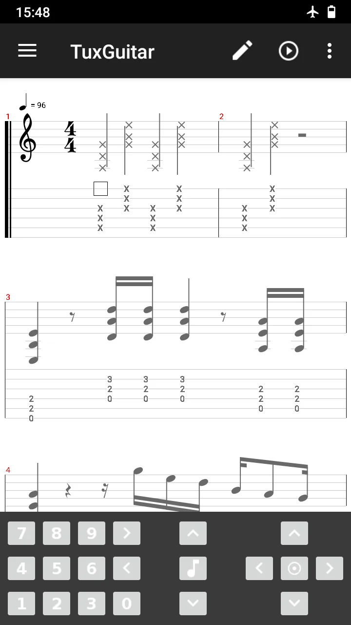 TuxGuitar on Android showing standard notation above guitar tablature and an on-screen editing keypad