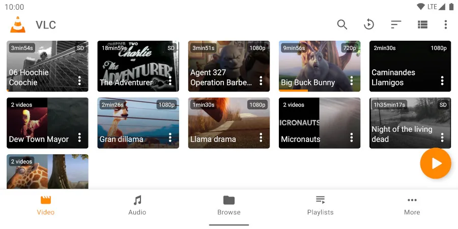 VLC for Android video library in landscape, showing video thumbnails, search and bottom navigation.
