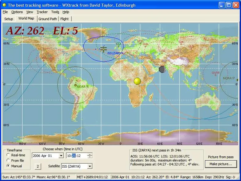 WXtrack world map with ISS ground tracks, satellite visibility footprints, day/night shading and pass timing controls